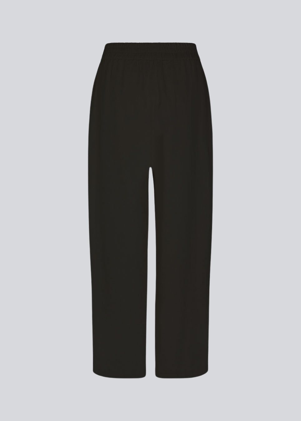 Pants in black designed with a casual look and fit in a cotton and linen blend. HonorMD pants has loose legs and a medium waist with a wide elastic band.