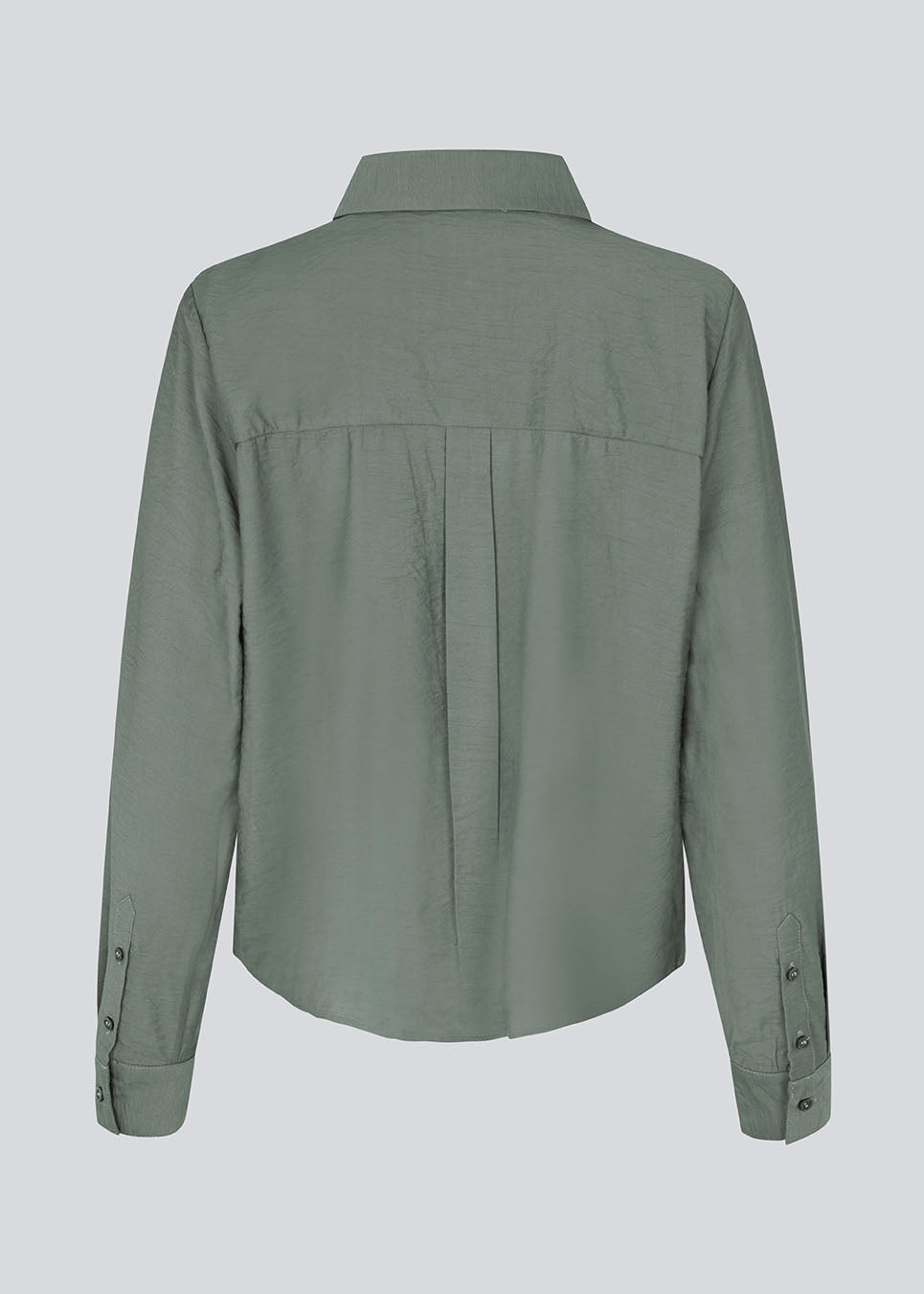 Shirt in soft green in a light EcoVero viscose with a loose fit. HudgesMD shirt has a collar, button closure in front, and long sleeves with cuff.&nbsp;