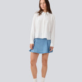 Shirt in a light EcoVero viscose with a loose fit. HudgesMD shirt has a collar, button closure in front, and long sleeves with cuff. 