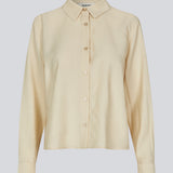 Shirt in beige in a light EcoVero viscose with a loose fit. HudgesMD shirt has a collar, button closure in front, and long sleeves with cuff.&nbsp;