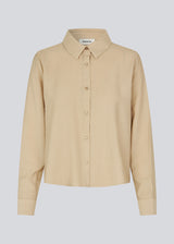 Shirt in beige in a light EcoVero viscose with a loose fit. HudgesMD shirt has a collar, button closure in front, and long sleeves with cuff.&nbsp;