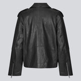 Jacket made from lamb leather in black with a slanted zipper in front, a lapel with push buttons, and long sleeves with a zipper at the hem. HullaMD solid jacket has slanted front pockets with a zipper in front. Lined. The model is 175 cm and wears a size S/36.