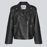 Jacket made from lamb leather in black with a slanted zipper in front, a lapel with push buttons, and long sleeves with a zipper at the hem. HullaMD solid jacket has slanted front pockets with a zipper in front. Lined. The model is 175 cm and wears a size S/36.