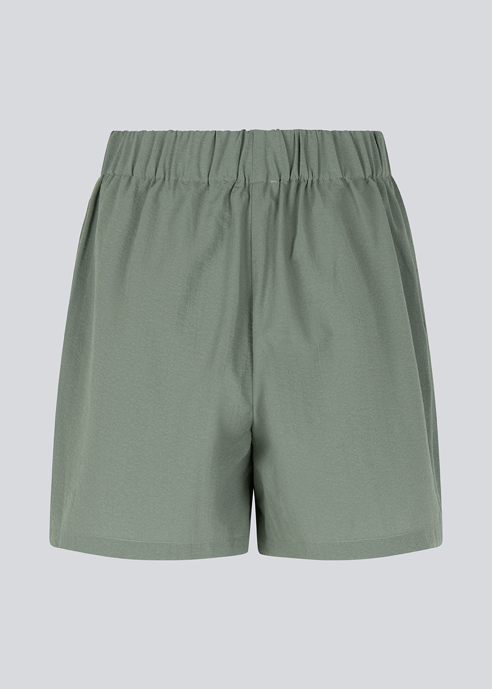 Shorts in soft green with a loose silhouette in a recycled material. HuntleyMD shorts has a medium waistline with covered elastication.&nbsp;