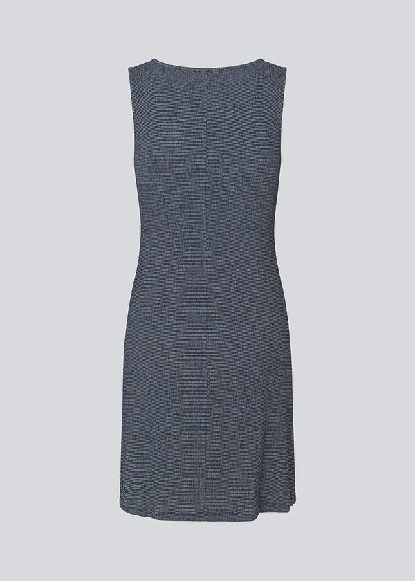 Sleeveless dress in an elastic structured material. IbsenMD dress has an a-facon and a round neckline. Slightly see-through.&nbsp;&nbsp;
