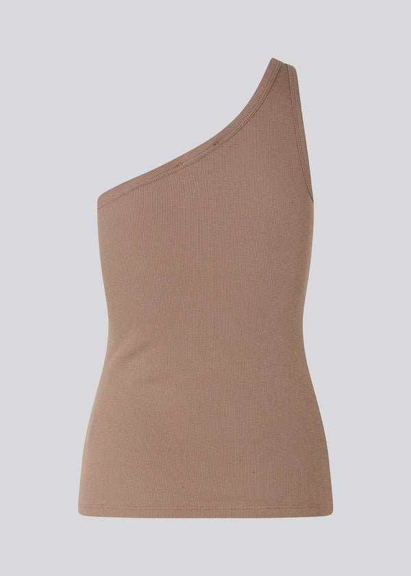 Comfortable, basic top in dark beige/brown in a soft cotton rib. Igor one one-shoulder top has a tight fit and asymmetrical strap, which makes the top perfect for a sporty look.