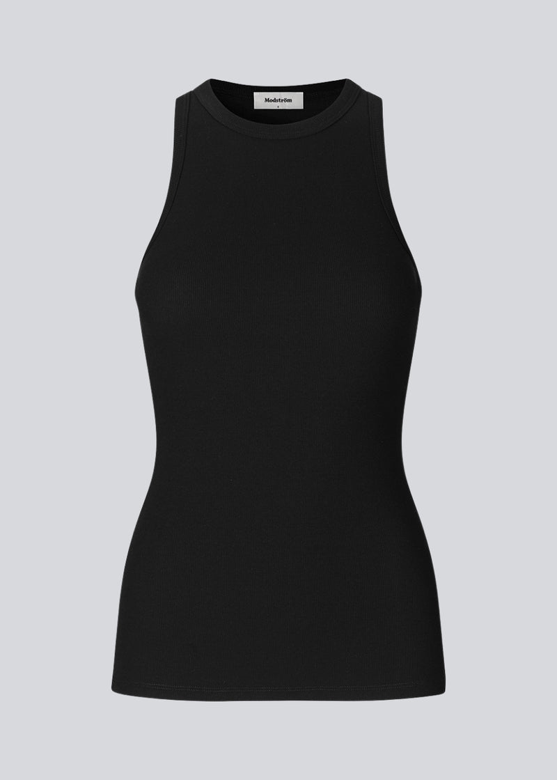 Cool basic top in af soft cotton rib. Our bestseller Igor top Black has a tight fit with a racer back. The top is perfect for a sporty look. See ALL Igor Tops.