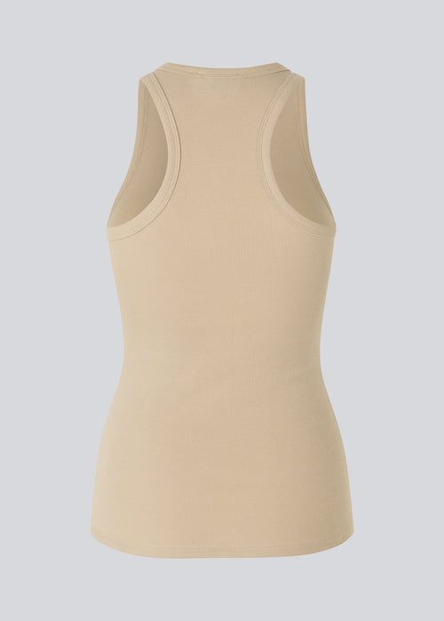 Cool basic light beige top in a soft cotton rib. Igor top has a tight fit with a racer back. The top is perfect for a sporty look.