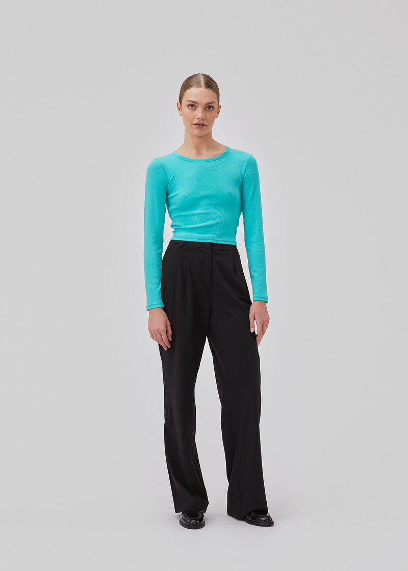 Soft basic crop top in the color atlantis in soft cotton rib with stretch. IgorMD LS crop top has a tight, cropped fit with long sleeves.