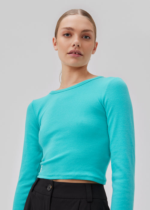 Soft basic crop top in the color atlantis in soft cotton rib with stretch. IgorMD LS crop top has a tight, cropped fit with long sleeves.