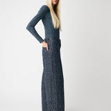 Soft, fitted long-sleeved T-shirt, made from organic cotton rib with stretch and finished with a round neckline. Layer it beneath tailoring or wear it with wide-leg trousers.
 