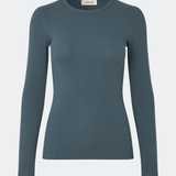 Soft, fitted long-sleeved T-shirt, made from organic cotton rib with stretch and finished with a round neckline. Layer it beneath tailoring or wear it with wide-leg trousers.
 