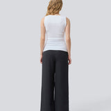 Sleeveless white top in ribbed cotton jersey. Igormd tank top has a thight fit and a round neckline. fit with long sleeves.