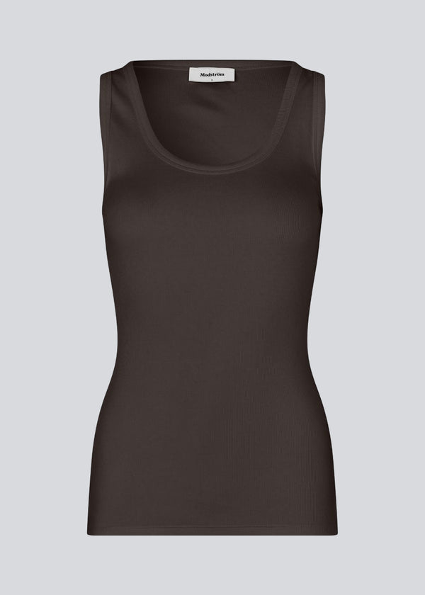 Sleeveless brown top in ribbed cotton jersey. Igormd tank top has a tight fit and a round neckline. fit with long sleeves.&nbsp;