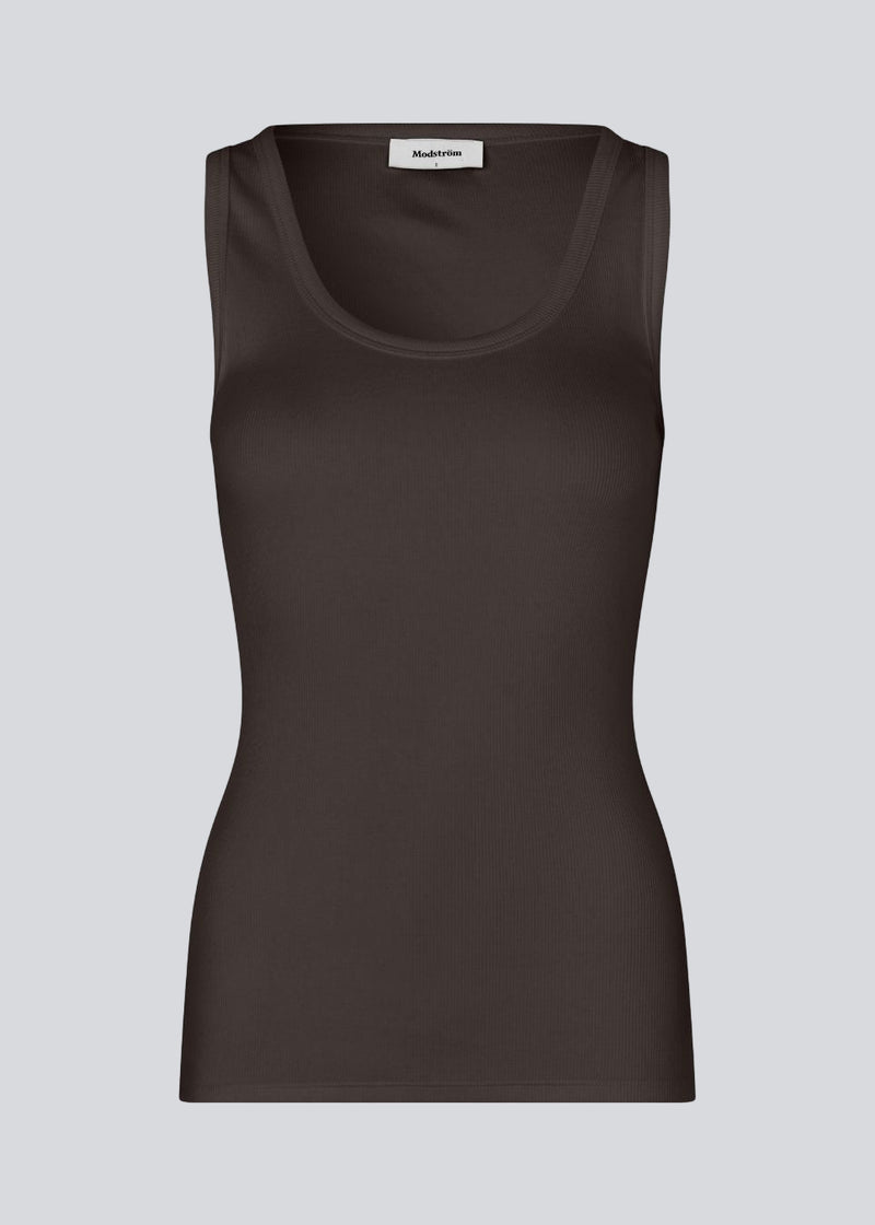 Sleeveless brown top in ribbed cotton jersey. Igormd tank top has a tight fit and a round neckline. fit with long sleeves.&nbsp;
