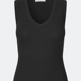 Sleeveless top in ribbed cotton jersey. Igormd tank top has a tight fit and a round neckline. fit with long sleeves. The model is 175 cm and wears a size s/36.