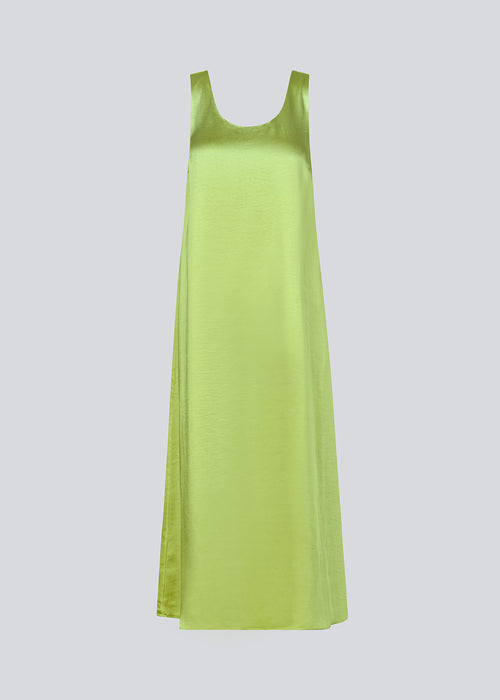 Long dress in green in satin with an A-line silhouette. IolaMD dress has a deep back neckline and wide straps.