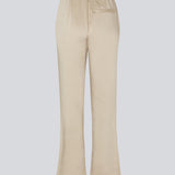 Flared pants in satin with an elastic in the back. IolaMD pants have a high waist, side pockets and a paspoli back pocket.
