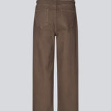 Brown jeans with wide legs in a cotton denim. IsoldeMD pants has a high waist, front and back pockets and a tie band at the waist.
