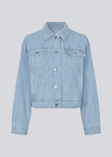Denim jacket with loose sleeves and a button closure. IsoldeMD jacket has two chest pockets and a bottom close at the sleeves and back.