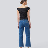 Flared jeans with of cotton denim. IsoldeMD solid cropped jeans have a high waist, zipper fly, and front and back pockets.