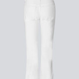 Flared jeans in white with of cotton denim. IsoldeMD solid cropped jeans have a high waist, zipper fly, and front and back pockets.

The model is 175cm and wears a size 27 (small).