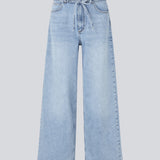 Jeans in denim blue with wide legs in a cotton denim. IsoldeMD pants have a high waist, front and back pockets and a tie band at the waist.