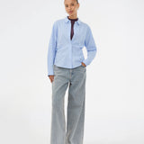 Jeans with wide legs in cotton denim in a light blue wash. IsoldeMD pants have a high waist, front and back pockets and a tie band at the waist.