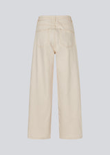 Jeans in Summer Sand with wide legs in a cotton denim. IsoldeMD solid pants has a high waist, front and back pockets and a tie band at the waist.