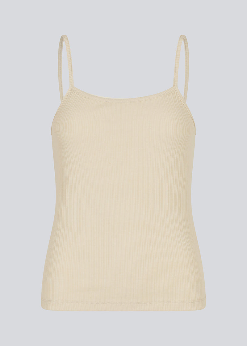 Classic top in beige/creme with thin straps. IvanMD top is made in a ribbed jersey material.<br>