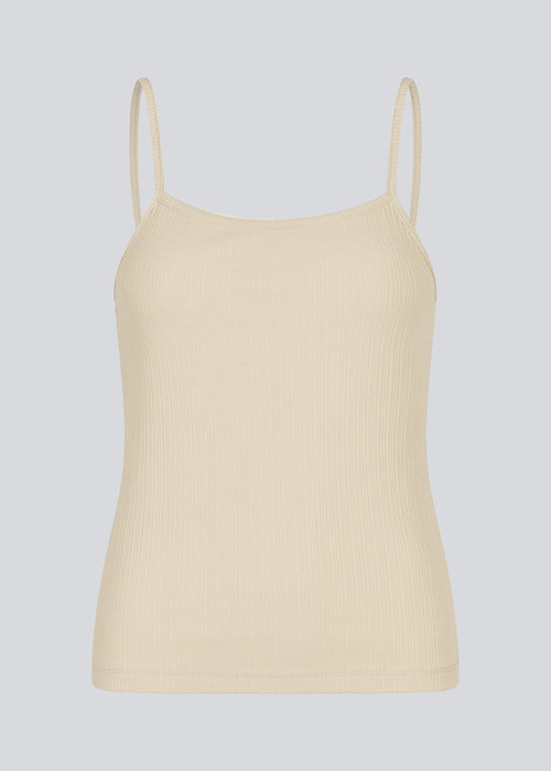 Classic top in beige/creme with thin straps. IvanMD top is made in a ribbed jersey material.<br>
