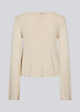 Knitted top with long sleeves and a wide neckline. IvonneMD O-neck has a normal fit.