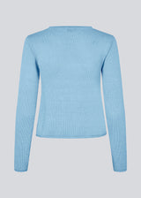 Knitted top in baby blue with long sleeves and a wide neckline. IvonneMD O-neck has a normal fit.Knitted top in baby blue with long sleeves and a wide neckline. IvonneMD O-neck has a normal fit. With inspiration from our Josefine Vogt x Modström style: JosefineMD knit top in the same color.<br>