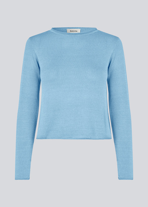 Knitted top in baby blue with long sleeves and a wide neckline. IvonneMD O-neck has a normal fit.Knitted top in baby blue with long sleeves and a wide neckline. IvonneMD O-neck has a normal fit. With inspiration from our Josefine Vogt x Modström style: JosefineMD knit top in the same color.<br>