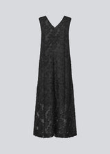 Sleeveless black dress in a slightly see-through material with lining. IvyMD dress has a loose fit and a V-neckline.