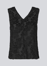 Sleeveless top in black in a slightly see through material with lining. IvyMD top has a loose fit and a V-neckline.