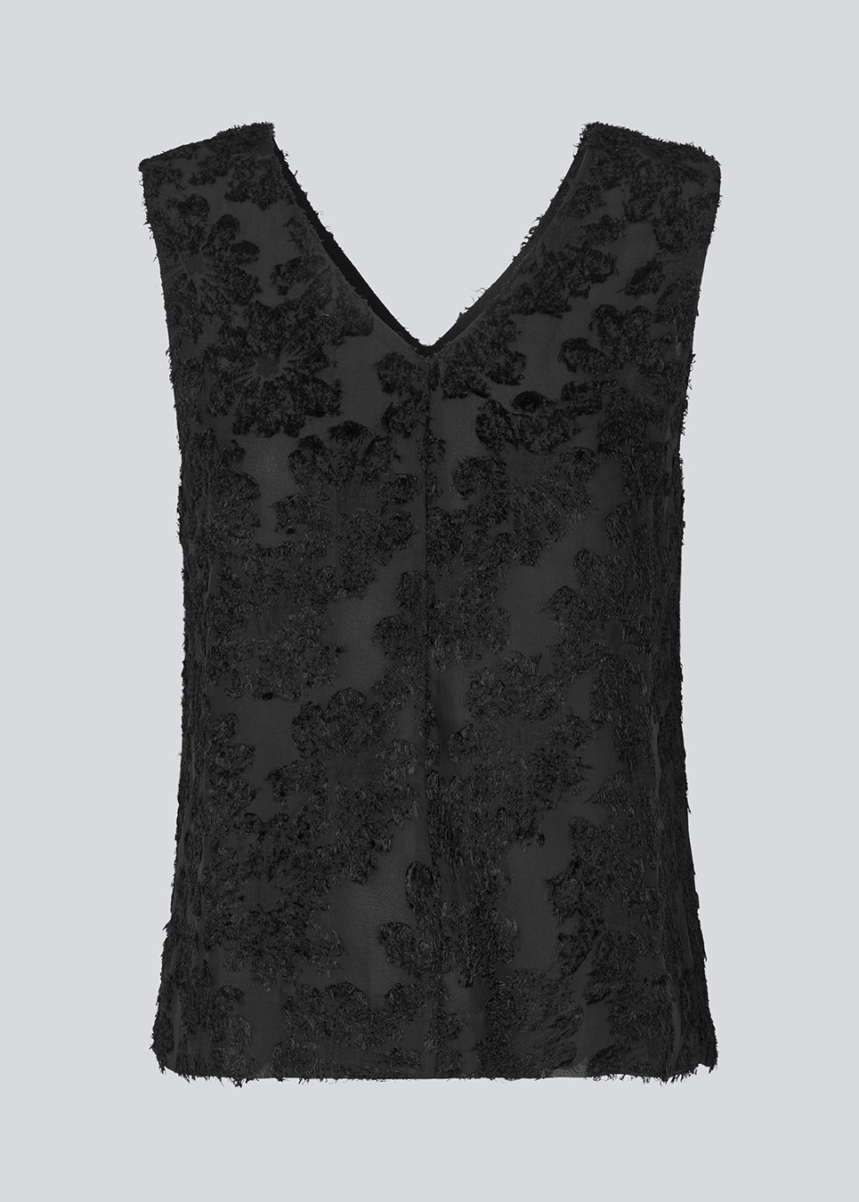 Sleeveless top in black in a slightly see through material with lining. IvyMD top has a loose fit and a V-neckline.