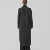Classic, double-breasted wool coat in a grey color with collar and notch lapels. JuniperMD check coat has a relaxed fit, lining and a slit in the back.