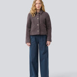 Short jacket in a wool mix. JustyMD short jacket has a loose fit, button closure and to pockets in front.