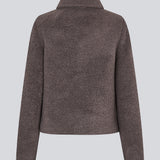 Short jacket in a wool mix. JustyMD short jacket has a loose fit, button closure and to pockets in front.