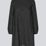 Short dress in embroidered cotton. KaidenMD dress has a classic A-line and an opening in front with a button closure.