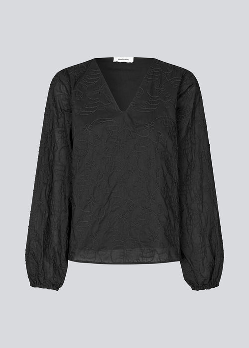 Top with long loose sleeves in embroidered cotton. KaidenMD top has a loose fit and a v-neck.