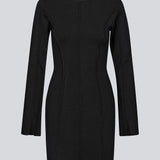 Short flat knitted dress with folded details in black. KaitoMD dress is fitted and has long wide sleeves.