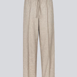 Pants with wide legs and stitched pintocks. KalemMD pants has side pockets and a string in the waist.