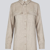 Beige long shirt with folded details in front. KalemMD shirt has two chest pockets, button closure in front and slits in the side seams.