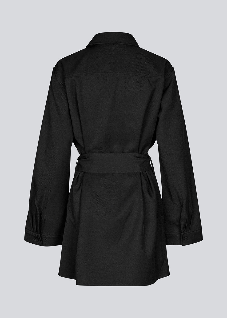 Shirtdress in black with tieband in the waist. KammyMD dress has a collar, button closure in front and belt loops.