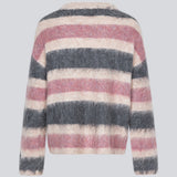 Soft knit with a V-neck. KaneMD v-neck has a loose fit and dropped shoulders.
