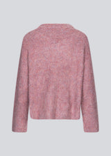 Soft purple knit with a V-neck. KaneMD v-neck has a loose fit and dropped shoulders.
