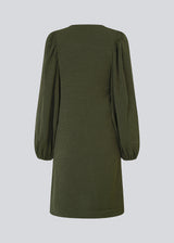 Dark green short dress in a light structured material. KarliMD short dress has puff sleeves and a V-neck.