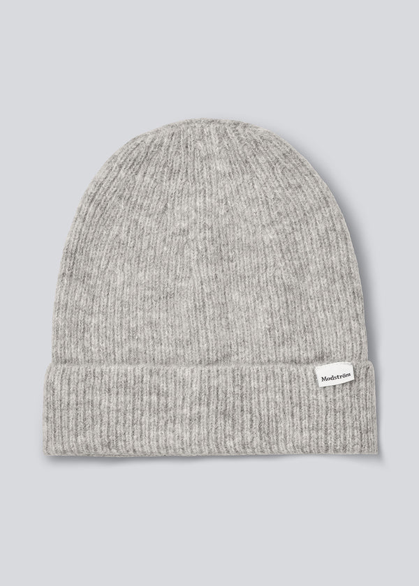 Warm grey hat in a nice wool mixture. Foxie hat is perfect for the cold days.